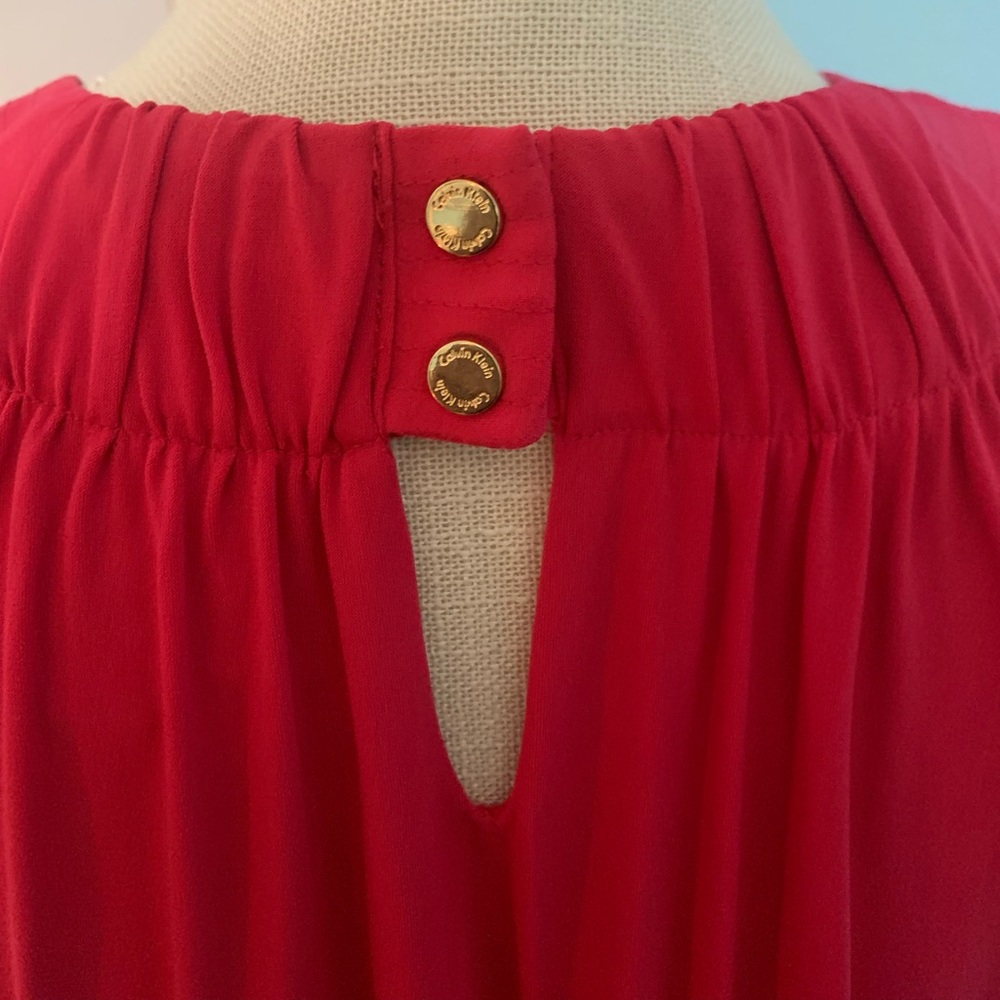 Calvin Klein Coral Shade Halter High Neck
Flowy Mini Dress
